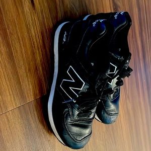 Women’s black leather new balance shoes. Size 5 1/2. Worn twice!